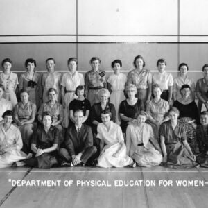Group Shot of men and women professors in gym