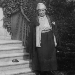 Marion Sparks standing in front of stairs